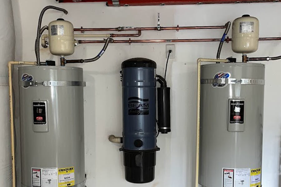 Two new water heaters in new home plumbing installation.