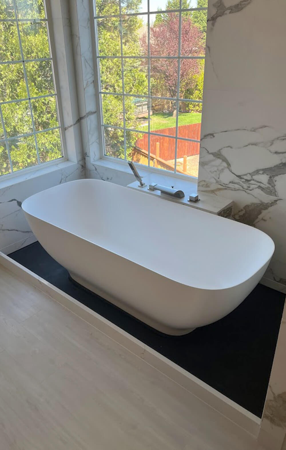 New soaking tub Installed in modern upgraded bathroom.